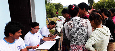 Delivering free health camp services to the Nagorkot Villagers